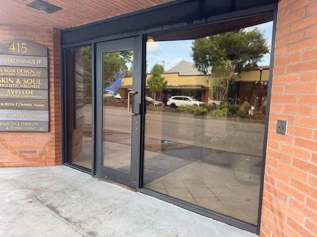 Commercial entrance doors after professional window cleaning - crystal clear