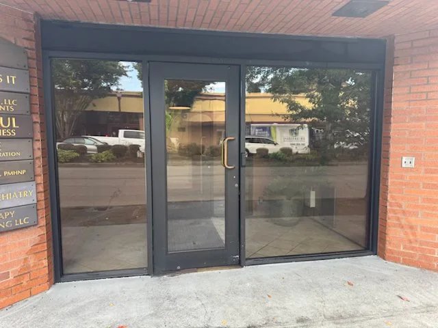 Commercial entrance doors before professional window cleaning