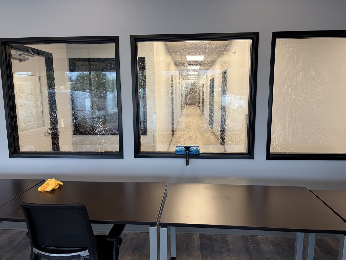 Streak-free commercial window cleaning by TBM - glass cleaned to full clarity